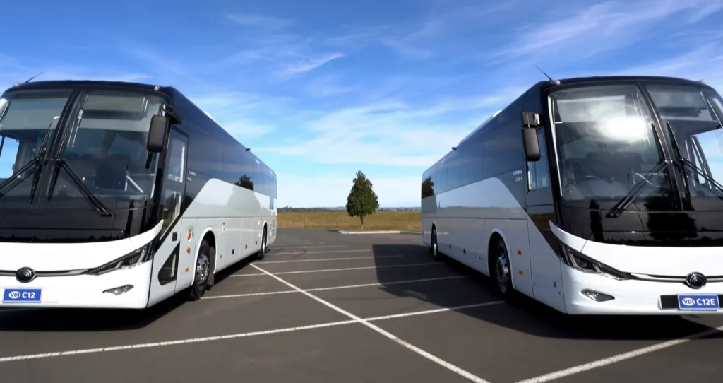 Yutong C12 and Yutong C12E in empty parking lot