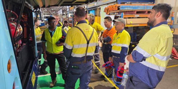 Conducting accredited safety training for technicians working on electric buses